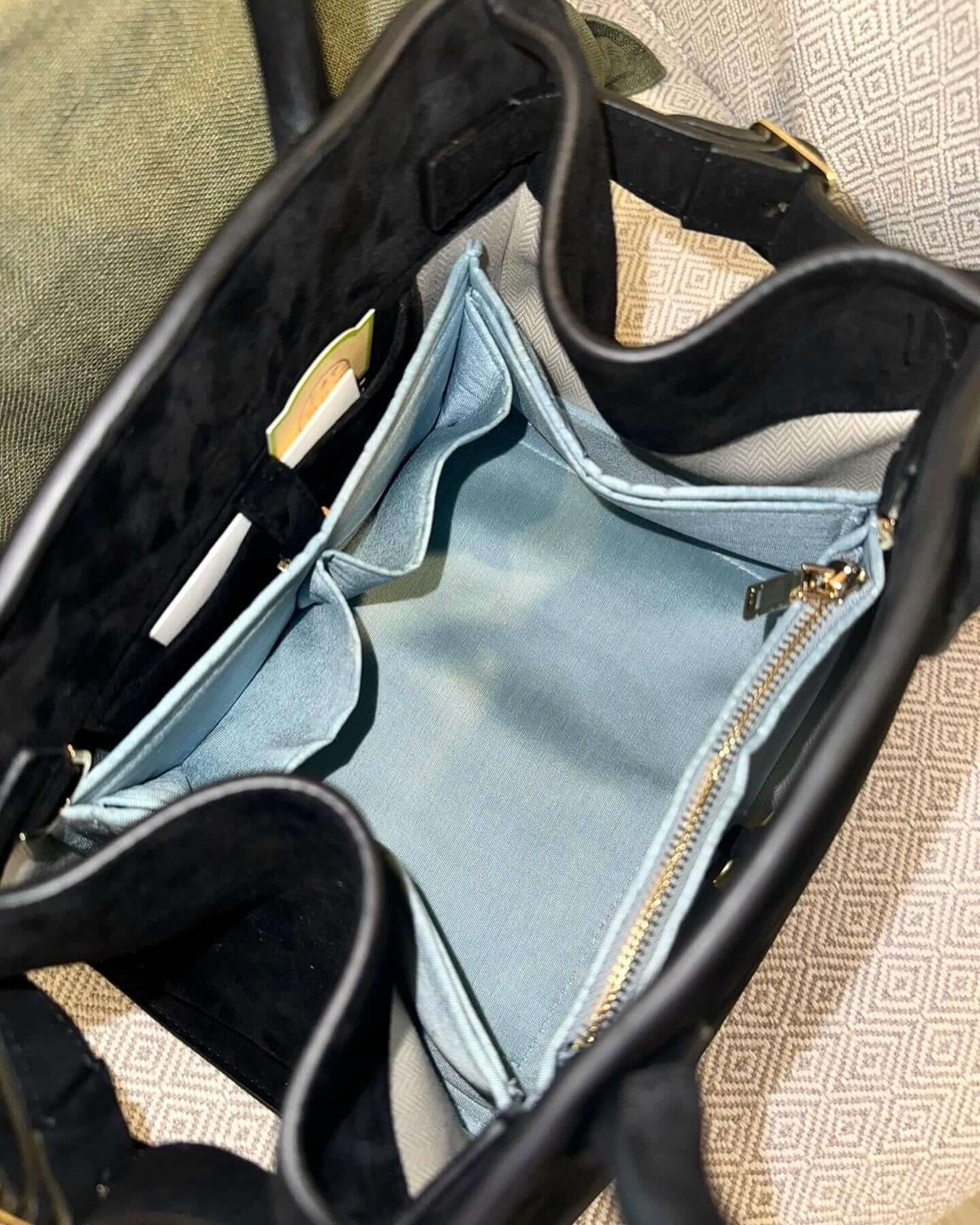 The Row Margeaux bag insert organizer in Thai silk, showcasing luxury and functionality for perfect bag organization.
